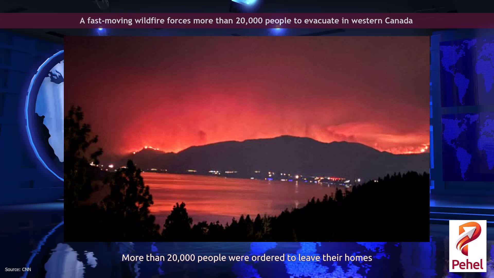 A fast-moving wildfire forces more than 20,000 people to evacuate in western Canada
